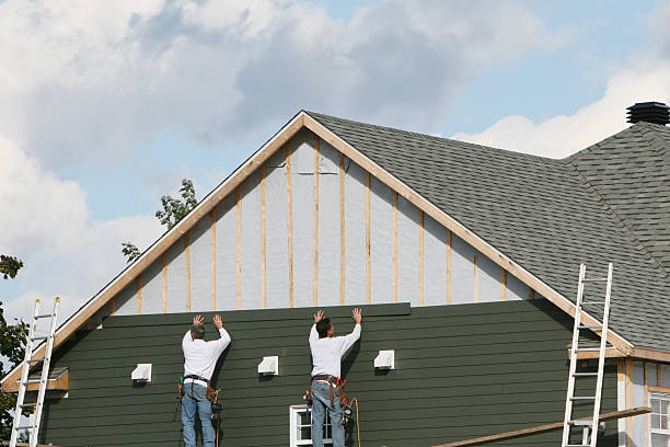 Professional Siding Contractor technician working in Old Westbury, NY